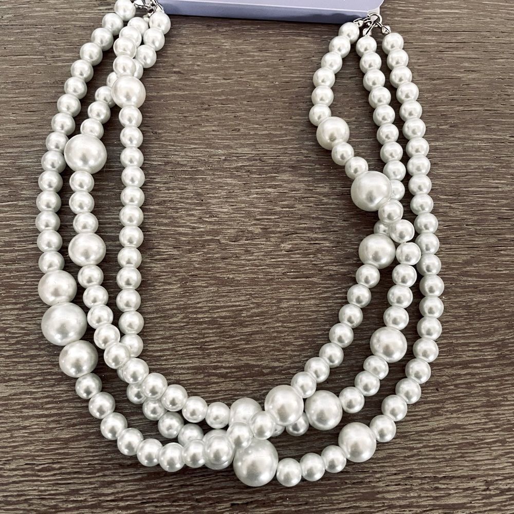 Claire’s 3-Strand White Glass Pearl Necklace